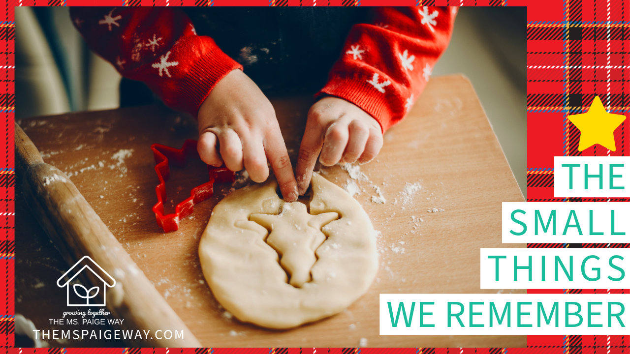 A child presses a Christmas tree cookie cutter into dough on a floured table, wearing a red holiday sweater. The image is framed with a red plaid border and includes the text “The Small Things We Remember” along with The Ms. Paige Way logo.