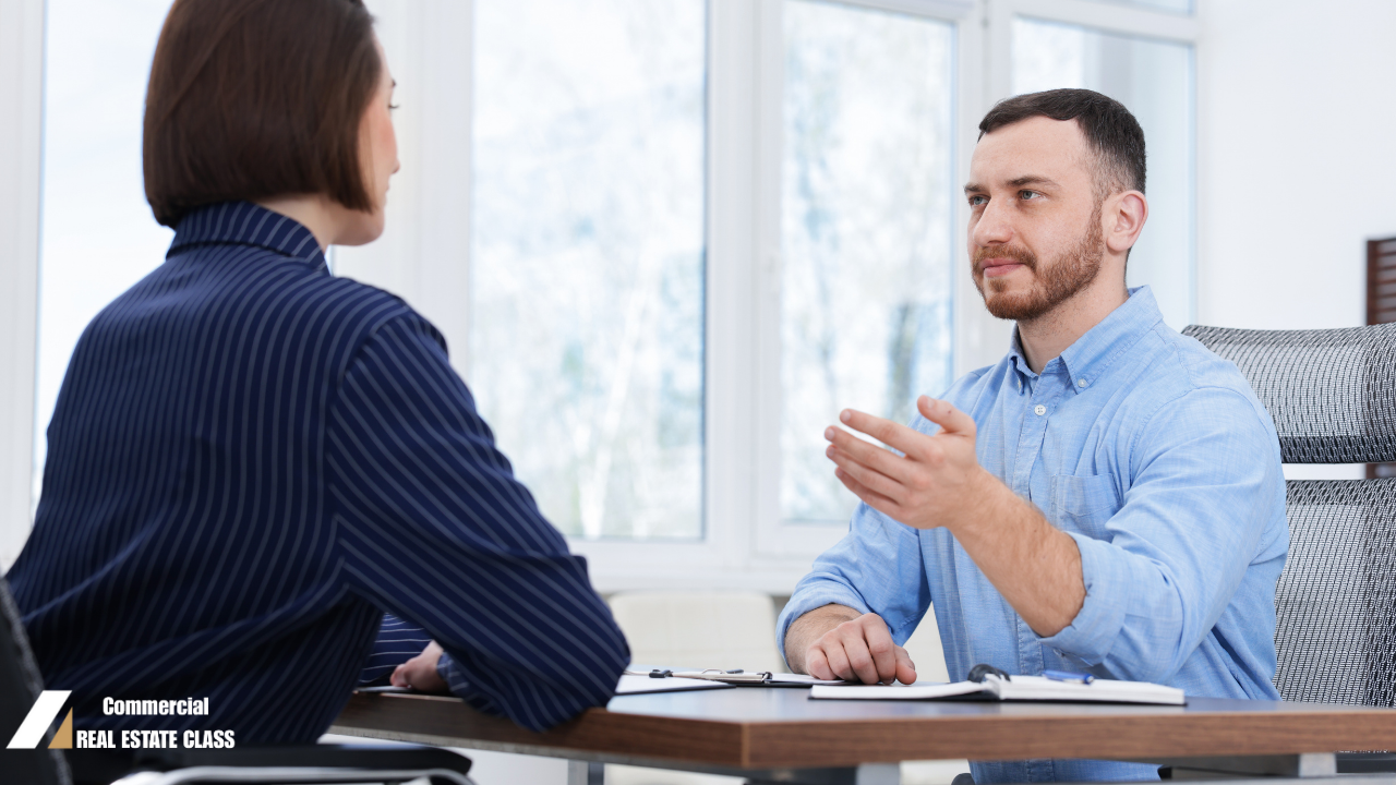 Commercial real estate investor discussing a direct-to-owner property deal during a meeting about potential commercial investment opportunities.