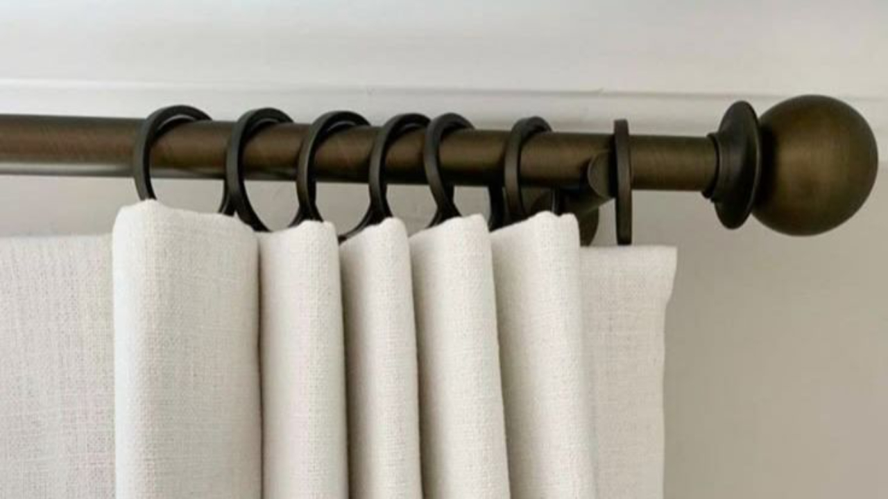 Inverted pleat curtain heading on rod