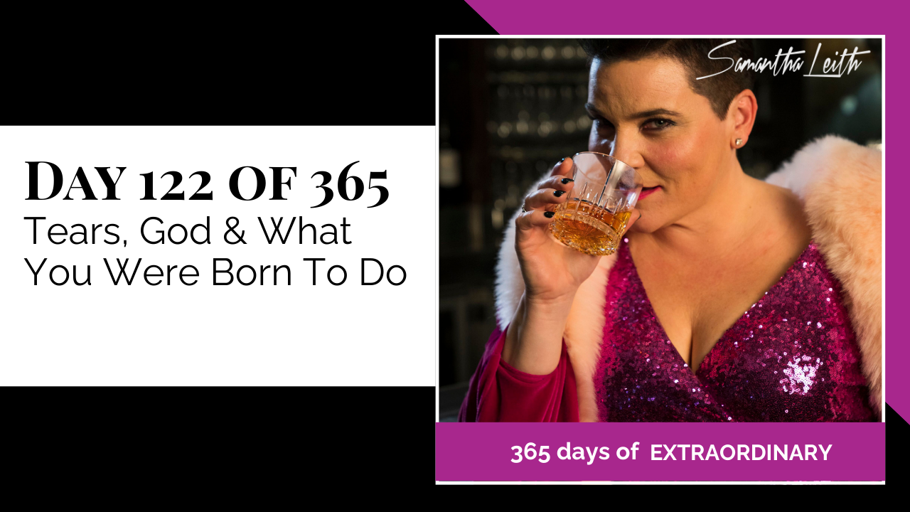 Blog image for Day 122 of Sam Leith's '365 Days of Extraordinary' series, featuring the author, Samantha Leith, wearing a shimmering pink dress and fur wrap, holding a glass of amber liquid, conveying a dramatic, reflective, or celebratory moment.