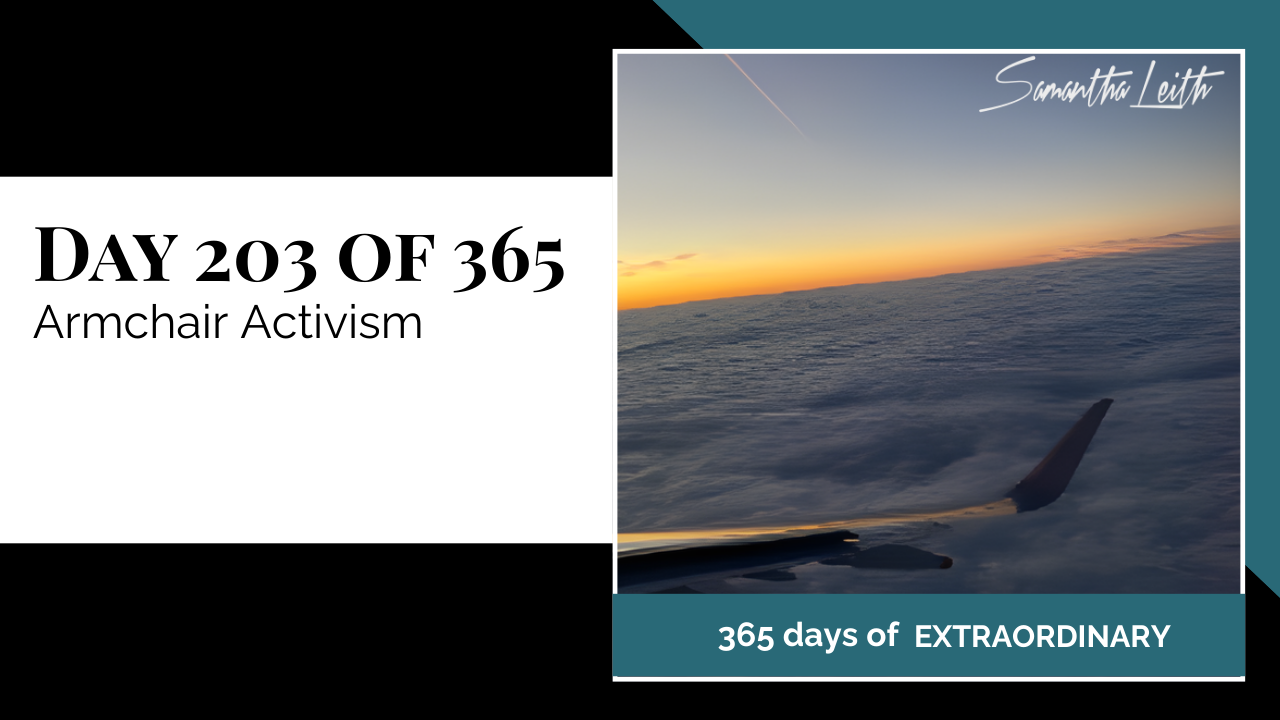 High-altitude photograph of a beautiful cloudscape at dawn or dusk, with the airplane wing visible in the foreground, used as a powerful visual metaphor to discuss the concept of "armchair activism," passive support, and engagement with social issues from a distance.