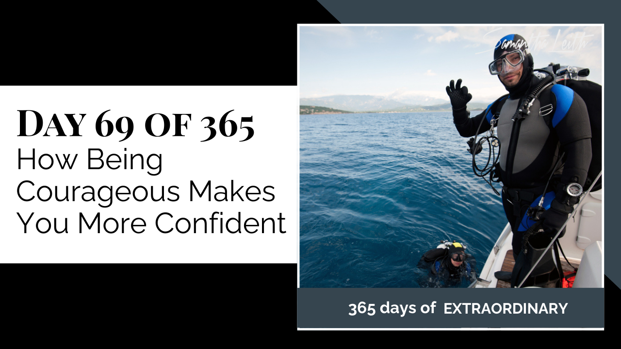Thumbnail graphic for the topic, 'How Being Courageous Makes You More Confident.' The image features a scuba diver in full gear standing on a boat and giving a "ring" or OK hand gesture, symbolizing overcoming fears, adventure, courage, and gaining confidence through new experiences.