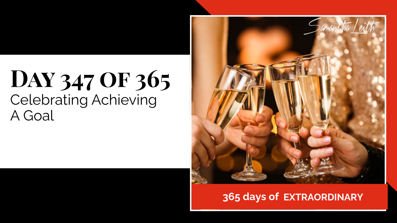 Day 347: Samantha Leith 365 Days of Extraordinary, Day 347: Celebrating Achieving A Goal. Visual features several hands holding up glasses of sparkling champagne in a toast against a blurred, golden bokeh background.