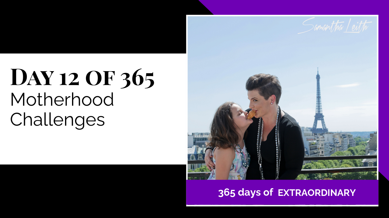 Promotional thumbnail for '365 Days of Extraordinary,' DAY 12 OF 365: Motherhood Challenges. Samantha Leith, dressed in black, is posing with her daughter in front of the Eiffel Tower, as the daughter playfully takes a bite of the food in her mother's mouth, illustrating a typical motherhood challenge.