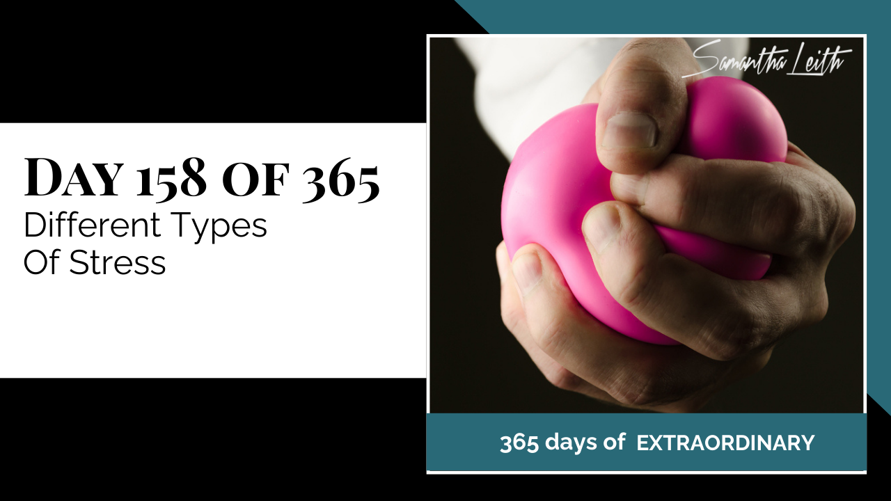 A dark, dramatic, close-up photo of a hand squeezing a hot pink stress relief ball, used to illustrate the negative effects of tension and the importance of understanding and managing different types of psychological stress for well-being.