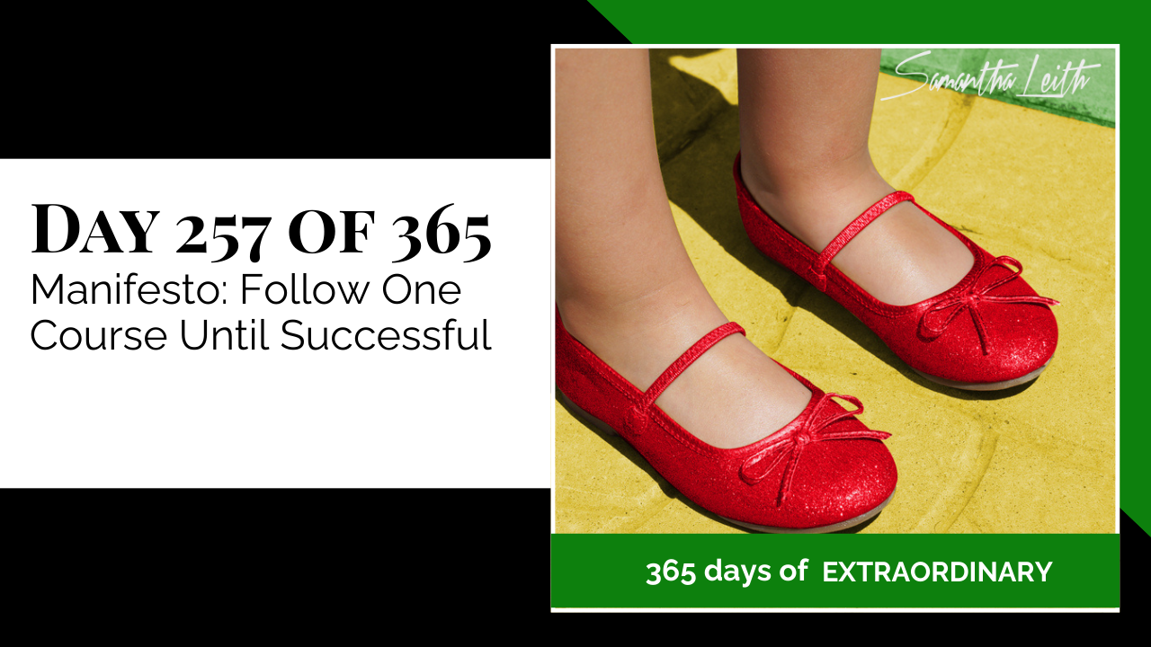 "Day 257 of 365: Manifesto: Follow One Course Until Successful thumbnail for Samantha Leith's '365 Days of Extraordinary' series. Close-up of a child's feet wearing sparkly red shoes on a yellow and green path."