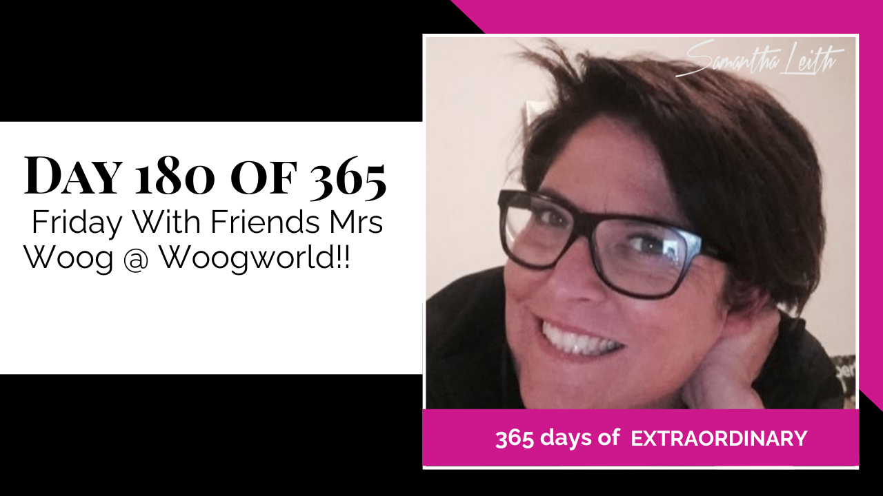 A warmly lit portrait of a woman with dark hair and glasses smiling at the camera, used to promote a featured interview, collaboration, or social media segment titled 'Friday With Friends Mrs Woog @ Woogworld!!'.