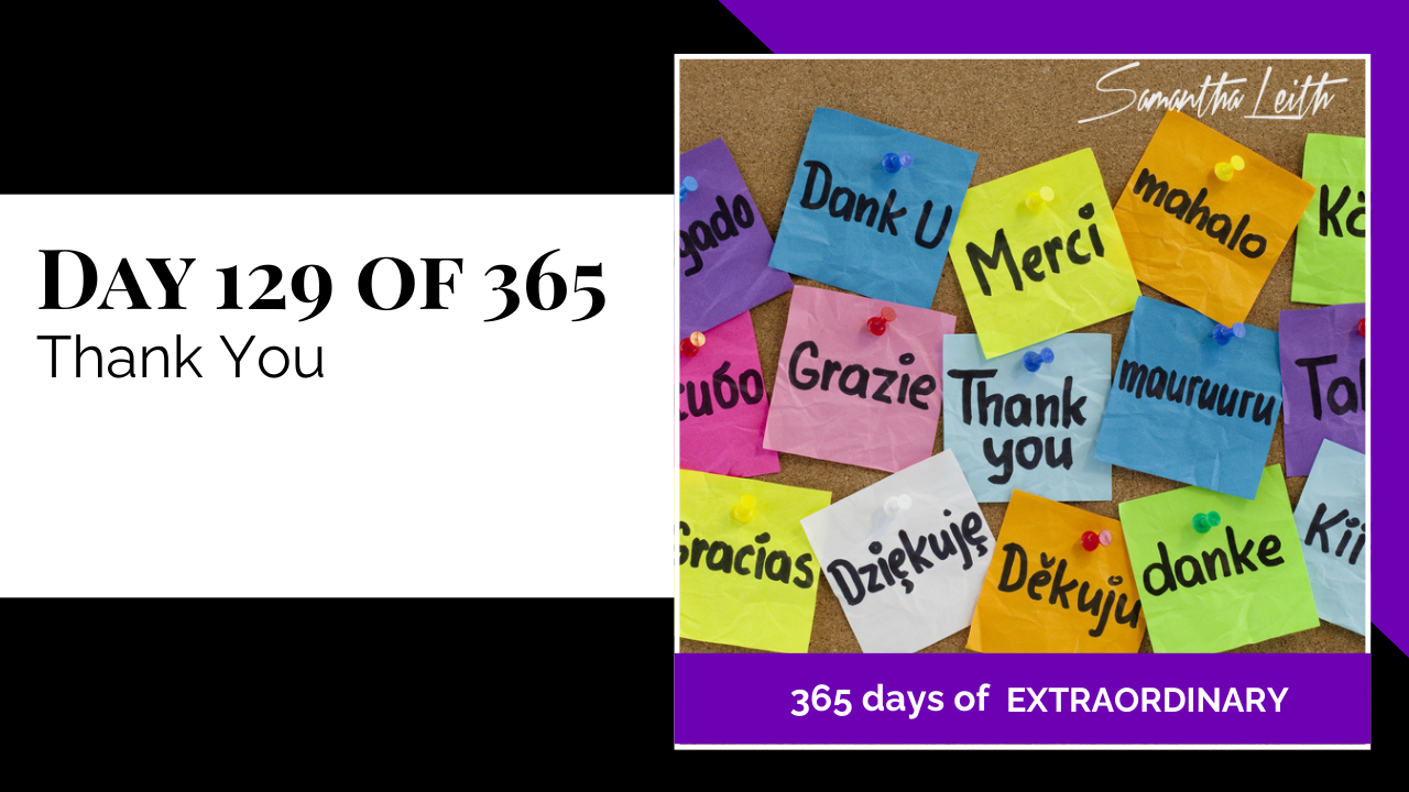Blog image for Day 129 of Sam Leith's '365 Days of Extraordinary' series, showing various brightly colored sticky notes (pink, orange, blue, green, purple) pinned to a corkboard, with the words "Thank you," "Merci," "Gracias," "Danke," and other gratitude terms written in multiple languages, symbolizing appreciation and thanks.