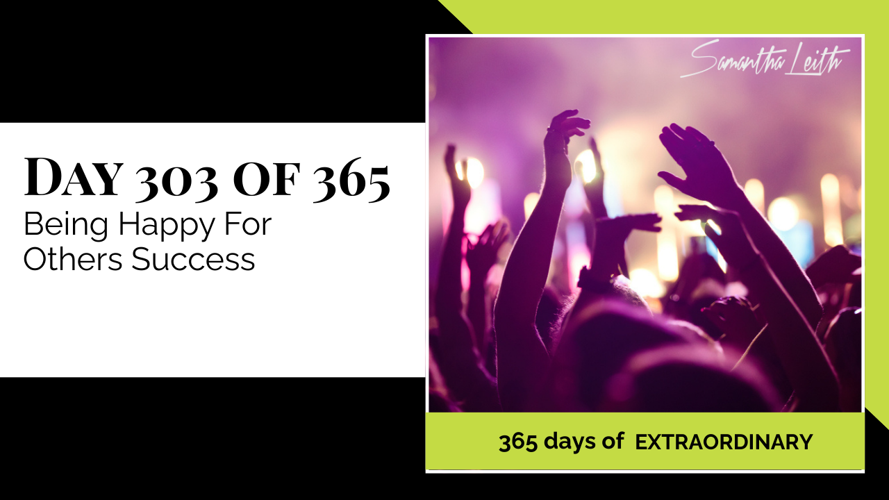 Samantha Leith 365 Days of Extraordinary, Day 303: Being Happy For Others Success. Visual of a crowd with silhouettes of hands raised in the air at a concert or celebration with purple lighting.