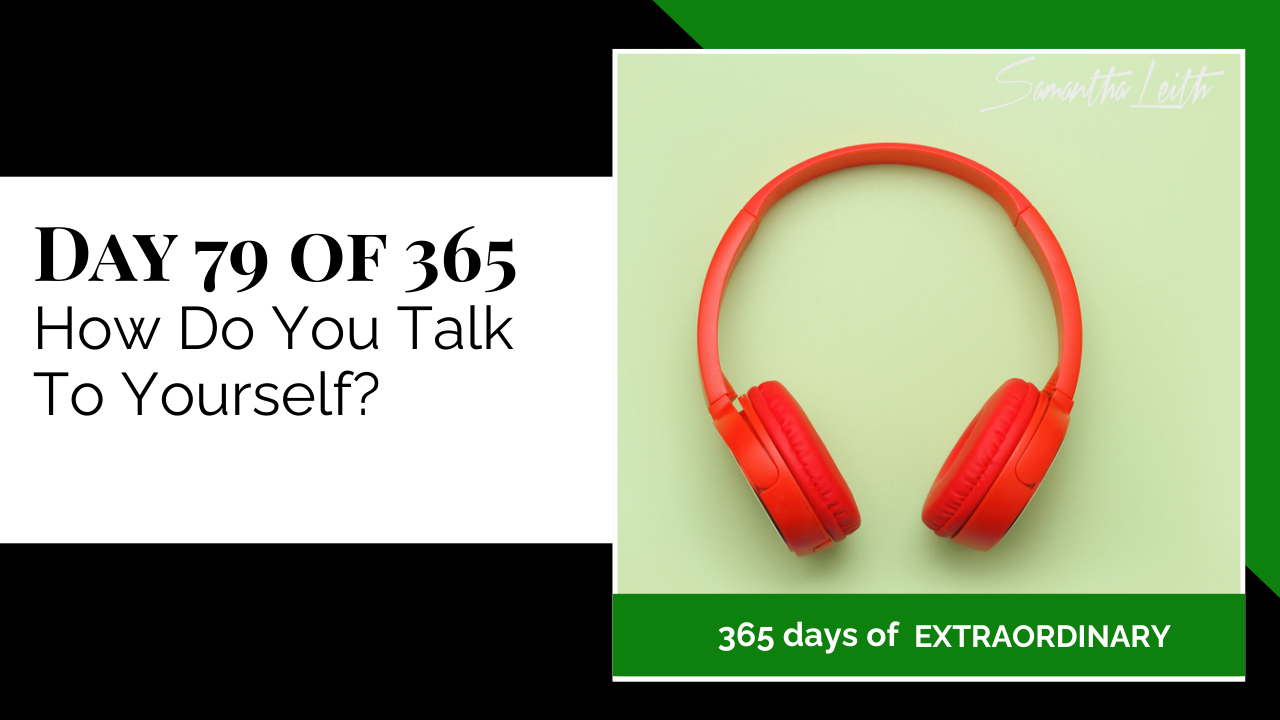 Blog thumbnail for 'Day 79 of 365: How Do You Talk To Yourself?' The image features a pair of bright red wireless headphones against a pale green background, symbolizing self-talk, internal dialogue, listening to positive affirmations, and mental fitness.
