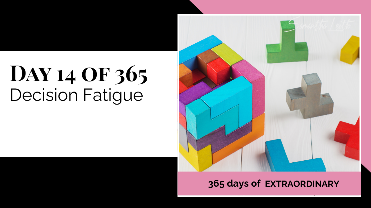 Promotional thumbnail for '365 Days of Extraordinary.' The text on the left clearly states 'DAY 14 OF 365: Decision Fatigue.' The right panel shows a completed, colorful wooden block puzzle forming a cube, surrounded by several individual, brightly colored geometric puzzle pieces scattered nearby on a white surface, visually representing the mental challenge and exhaustion of continuous decision-making.