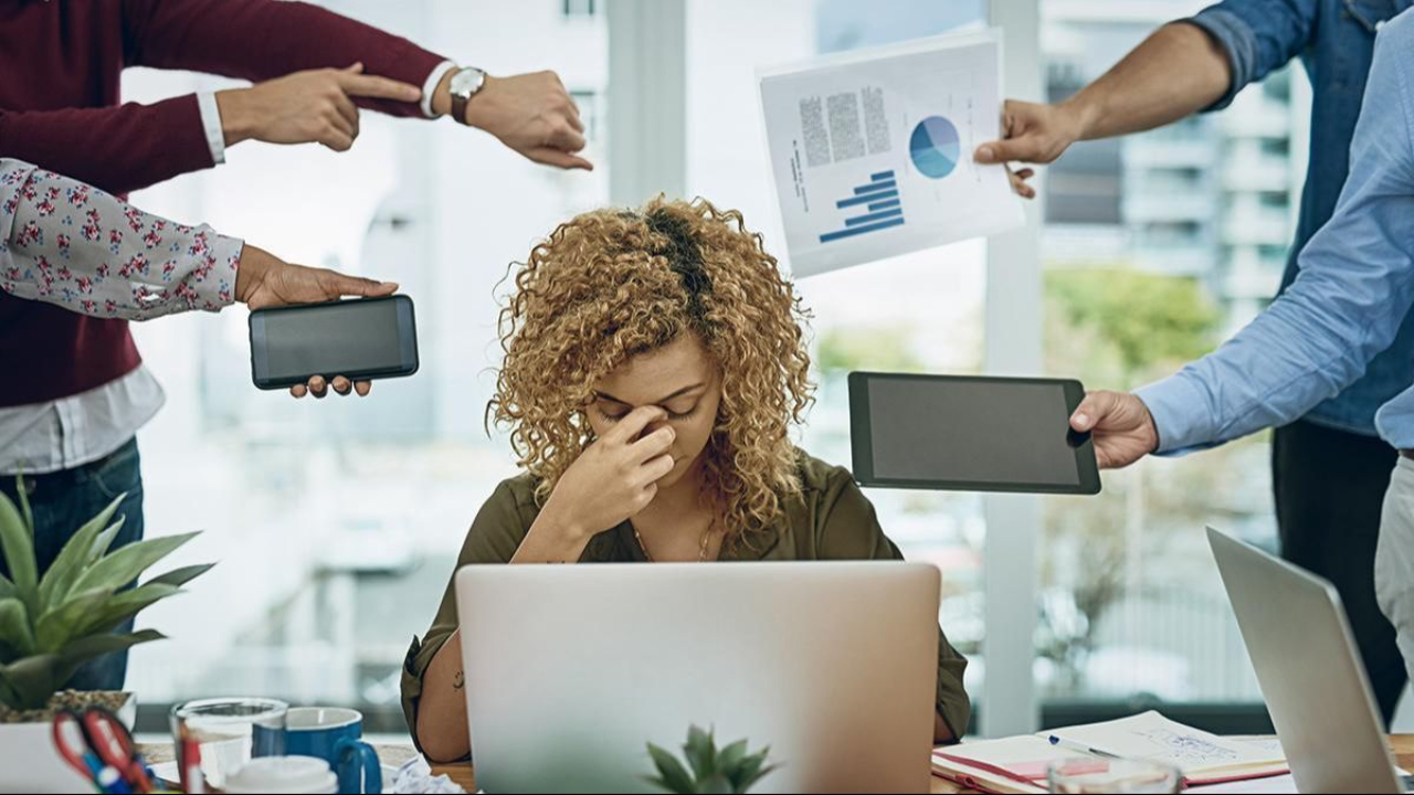 stressed woman with many tasks