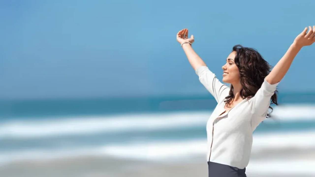 lady with arms in arm with a sense of freedom