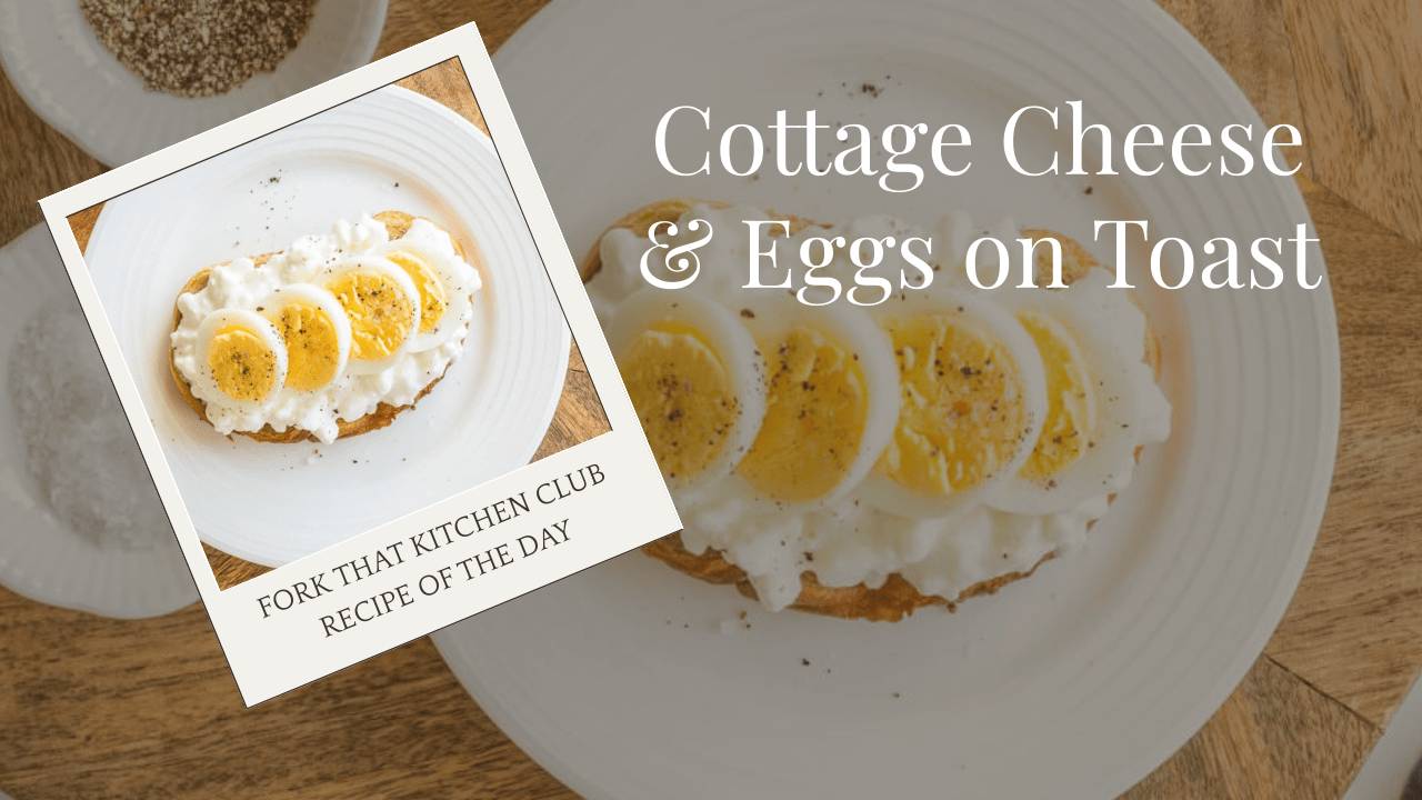 Slice of whole grain toast topped with cottage cheese and sliced hard-boiled eggs on white plate, small bowls of salt and pepper to the side on light wood cutting board