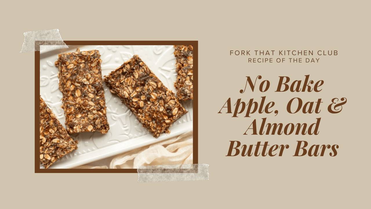 Five no-bake apple oat almond butter bars arranged on a white rectangular plate. The gluten-free snack bars show visible texture from rolled oats, hemp seeds, and chia seeds with golden-brown coloring from cinnamon and dates. A cream-colored linen napkin sits beside the plate. These plant-based protein bars are refrigerated rather than baked, making them an easy menopause-friendly snack with no refined sugar. The bars appear chewy and dense with natural ingredients.