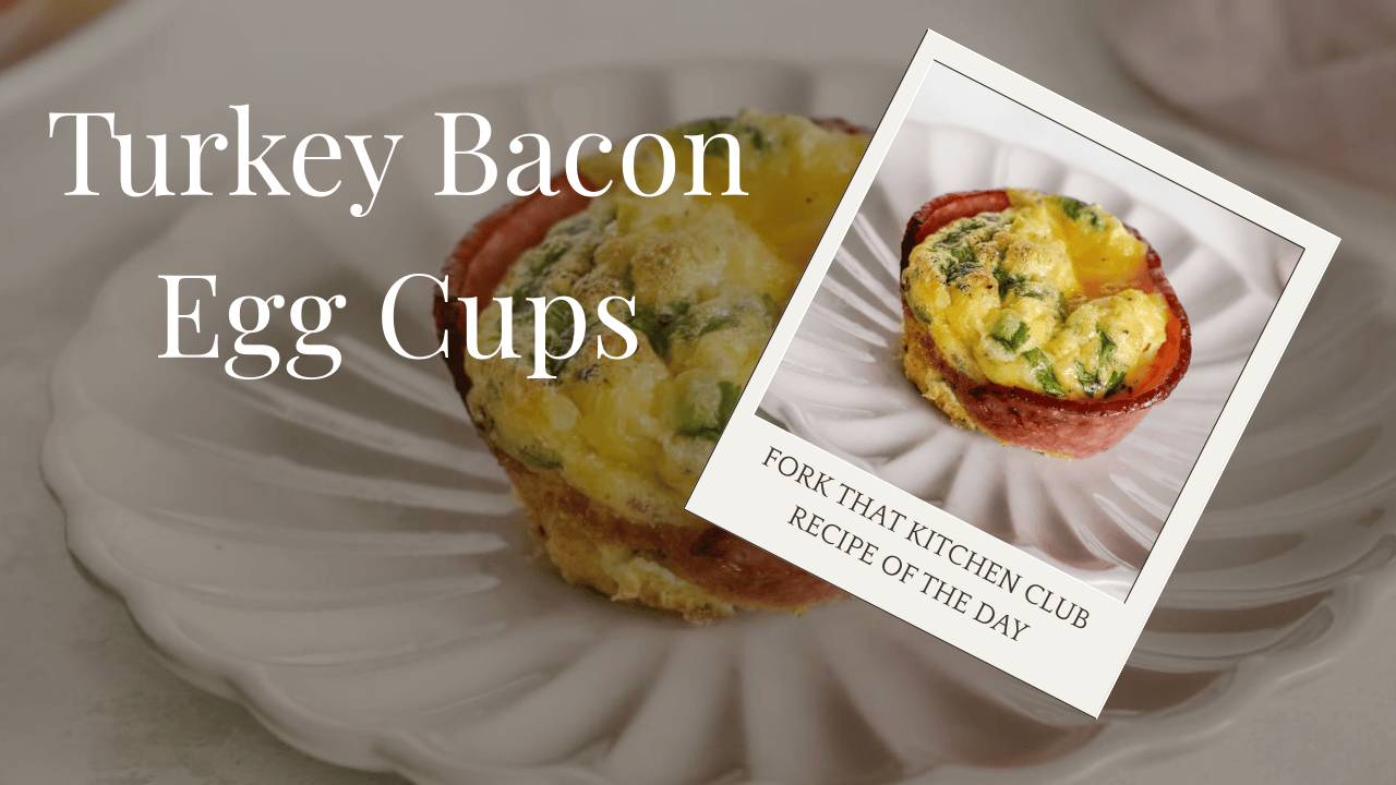 Turkey bacon wrapped egg cup with melted cheddar cheese and fresh cilantro on top served on a white, fluted plate