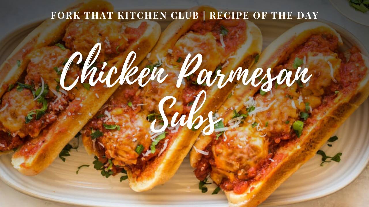 Three Chicken Parmesan Subs on a white plate, each golden melted cheese, meatballs covered in marinara sauce, and fresh parsley garnish on a toasted bun