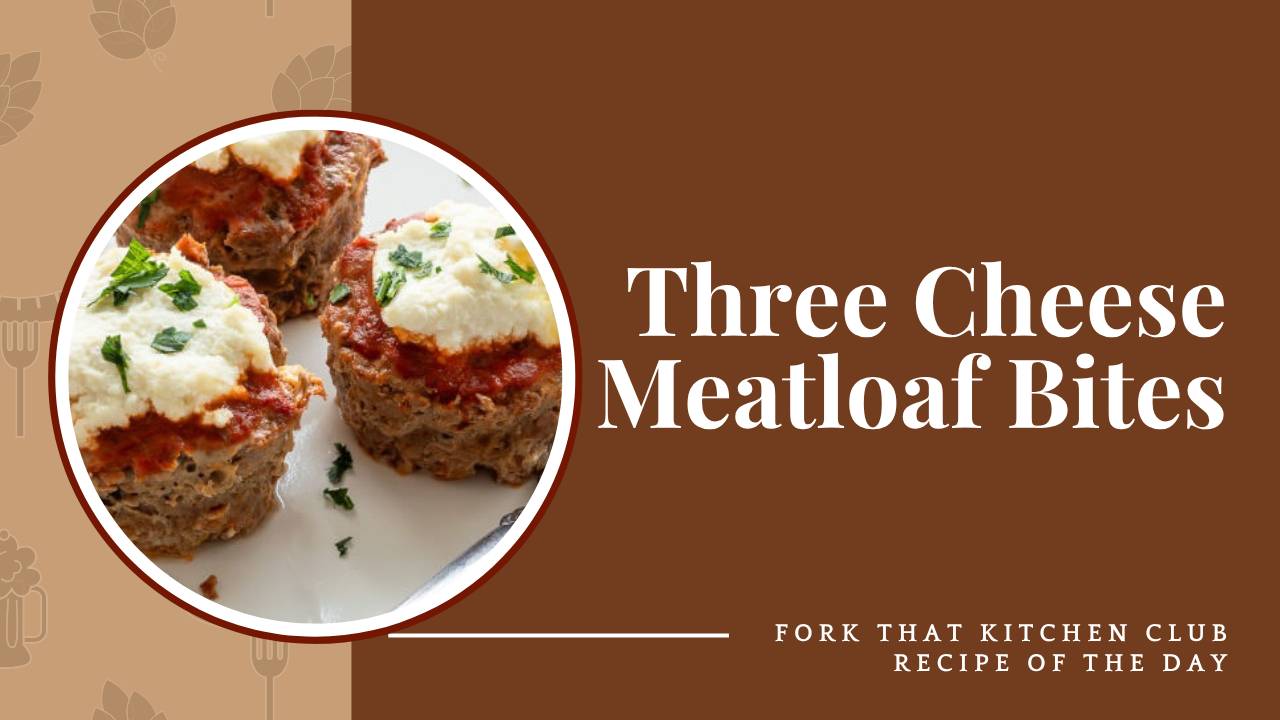 Three Three Cheese Meatloaf Bites on a white plate with melted cheese and tomato sauce on top, garnished with fresh parsley