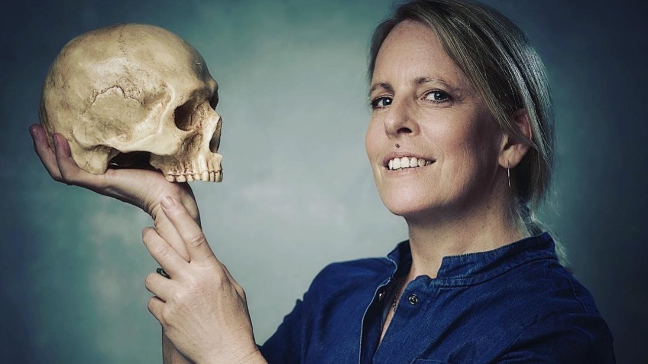 women holding a skull