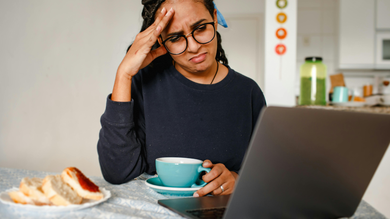 Frustrated women looking at laptop