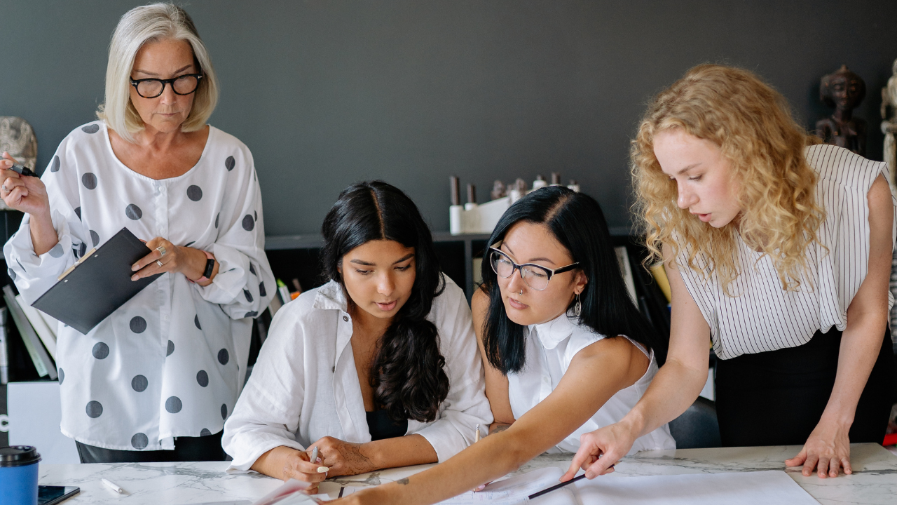 collab with women on table