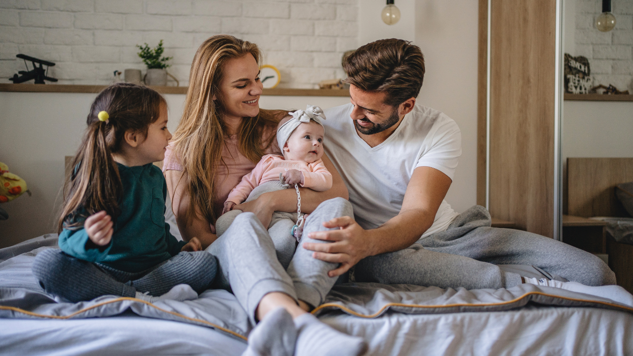 family on a bed