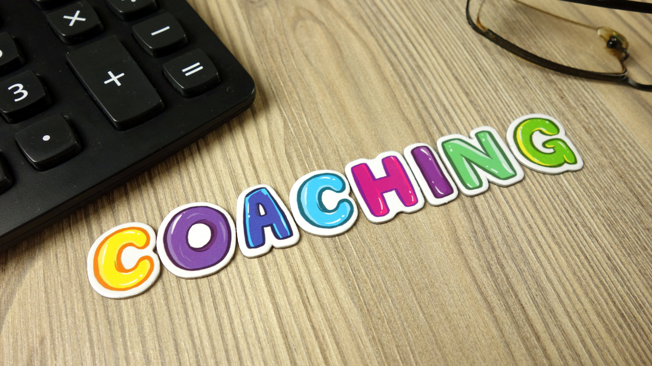 coaching in letters on table