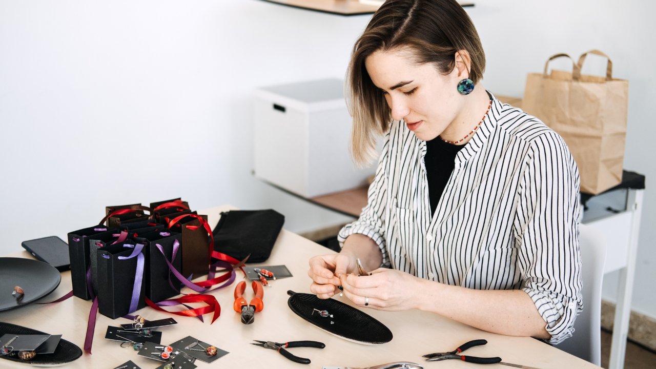 someone making custom jewlery