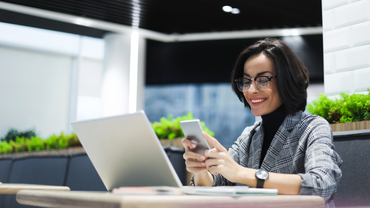 happy founder on a computer