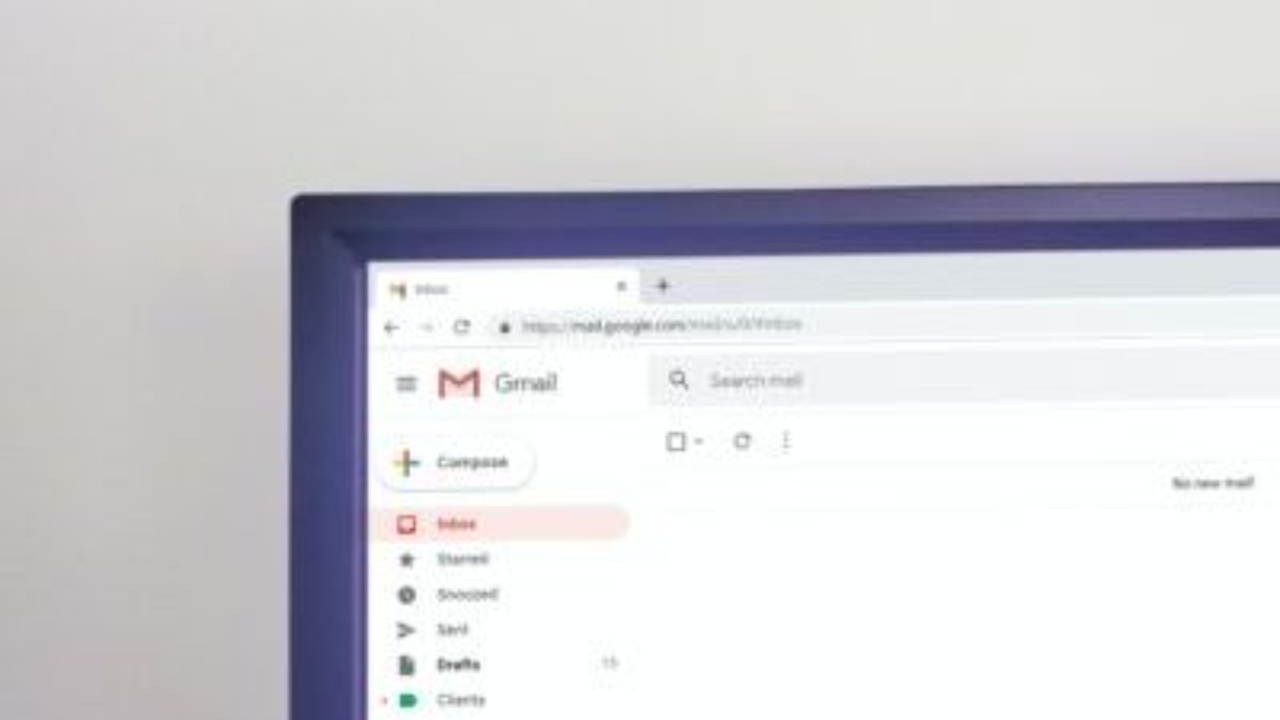 Close-up of a computer monitor displaying an open Gmail inbox