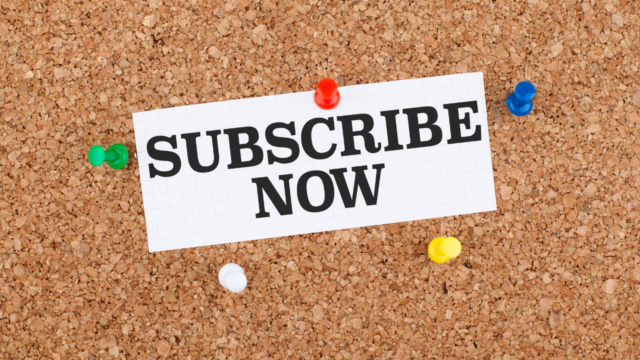 Cork board with subscribe now sign 