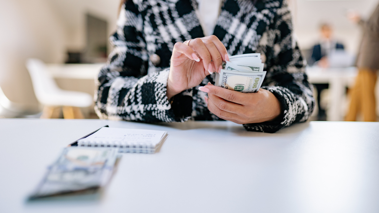 woman counting cash