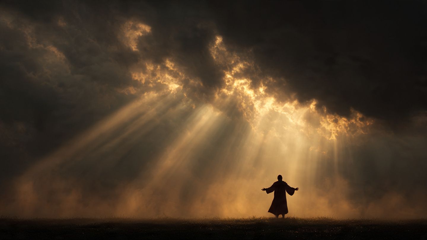 Person standing in divine light symbolizing spiritual warfare and victory.