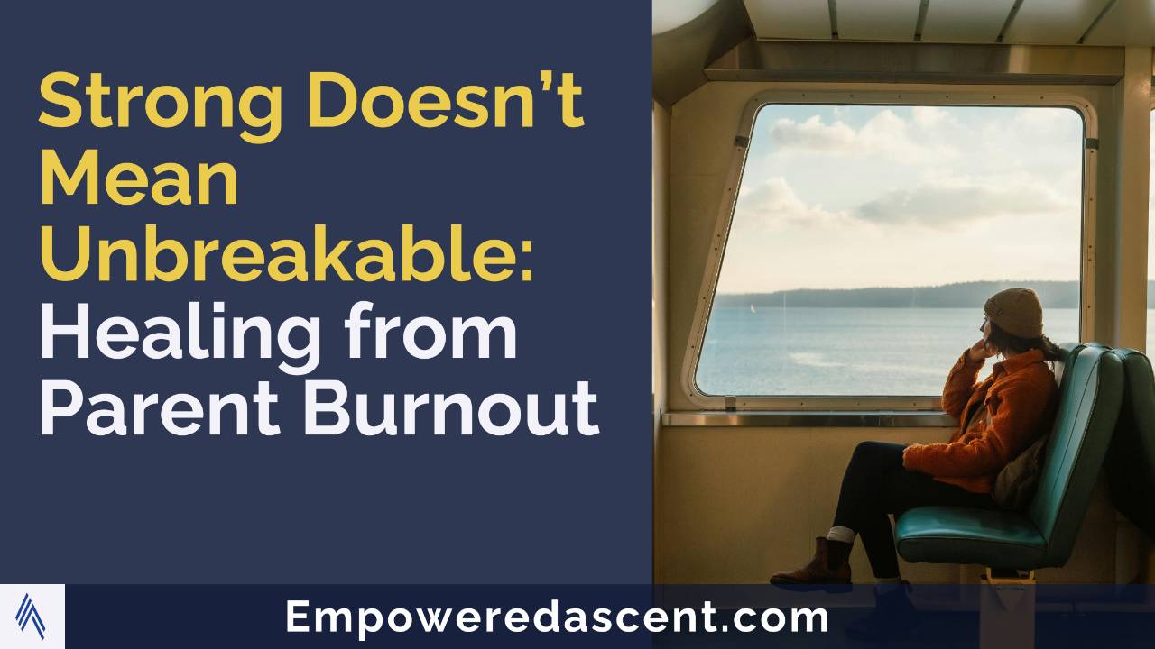 Parent sitting near a window with coffee, reflecting on burnout and recovery