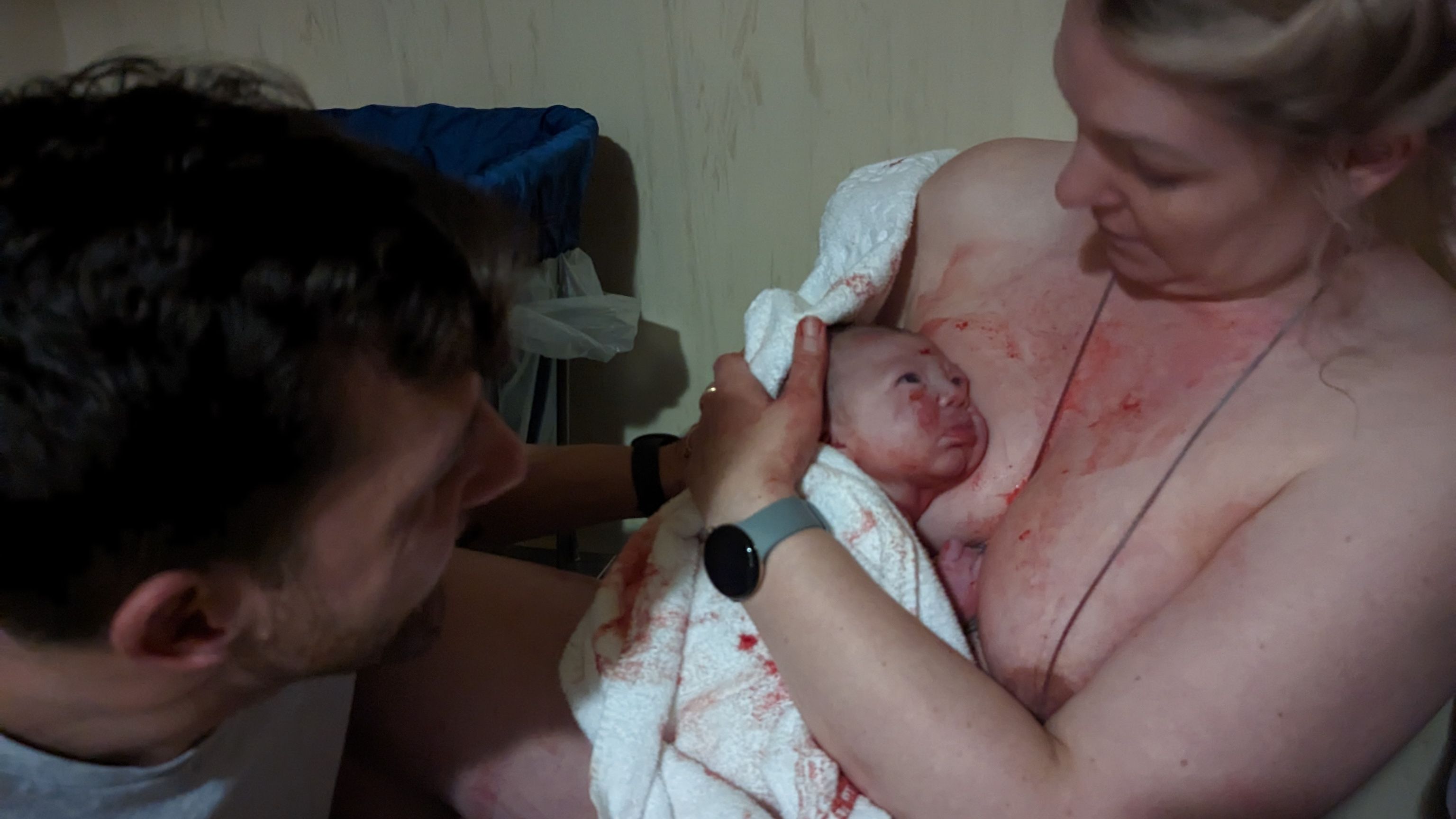 Calmbirth with Amy Watson. First time parent. Physiological labour. Dad catching baby. Vaginal birth. Skin to skin. Breastfeeding. Positive birth experience. 