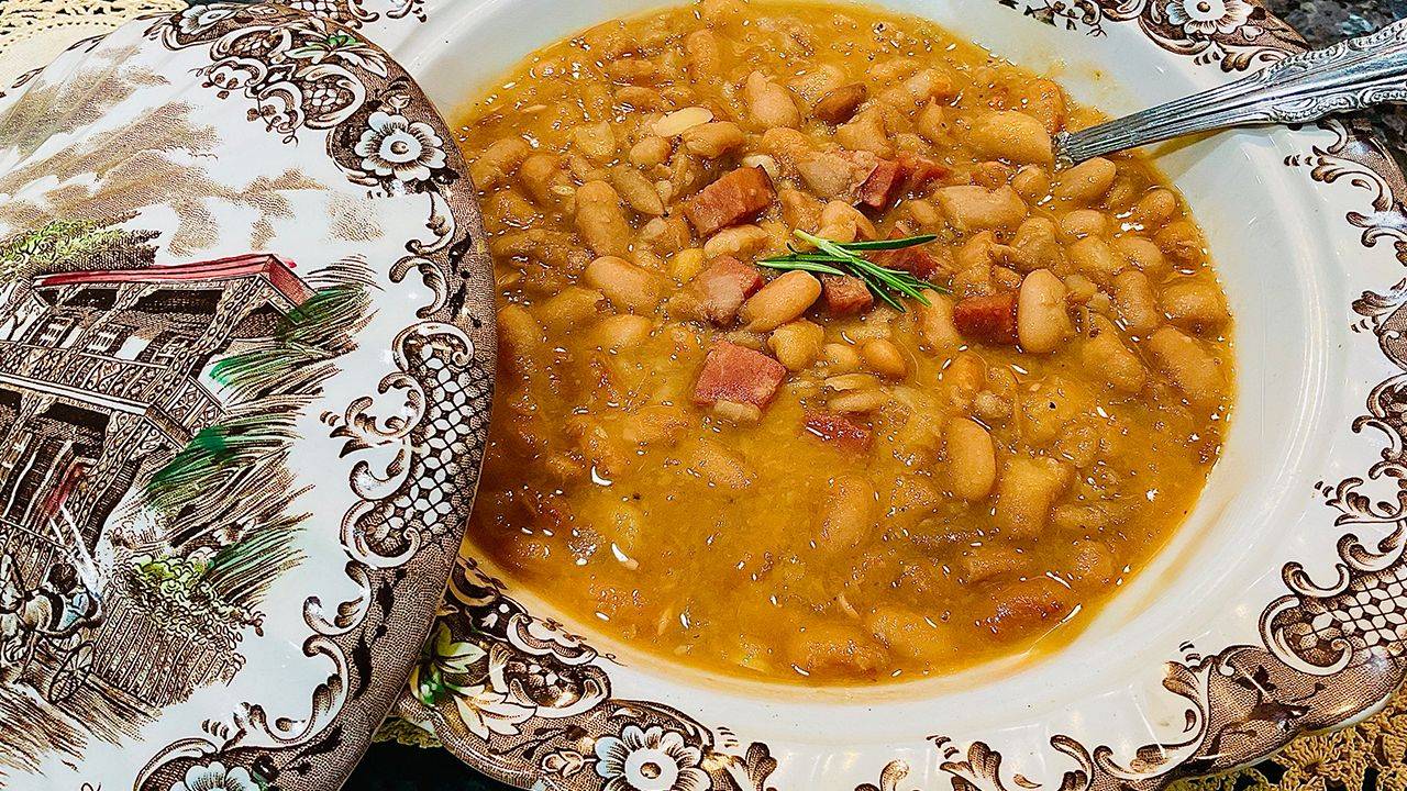 Pinto beans with Tasso simmered in a Cajun-style pot.