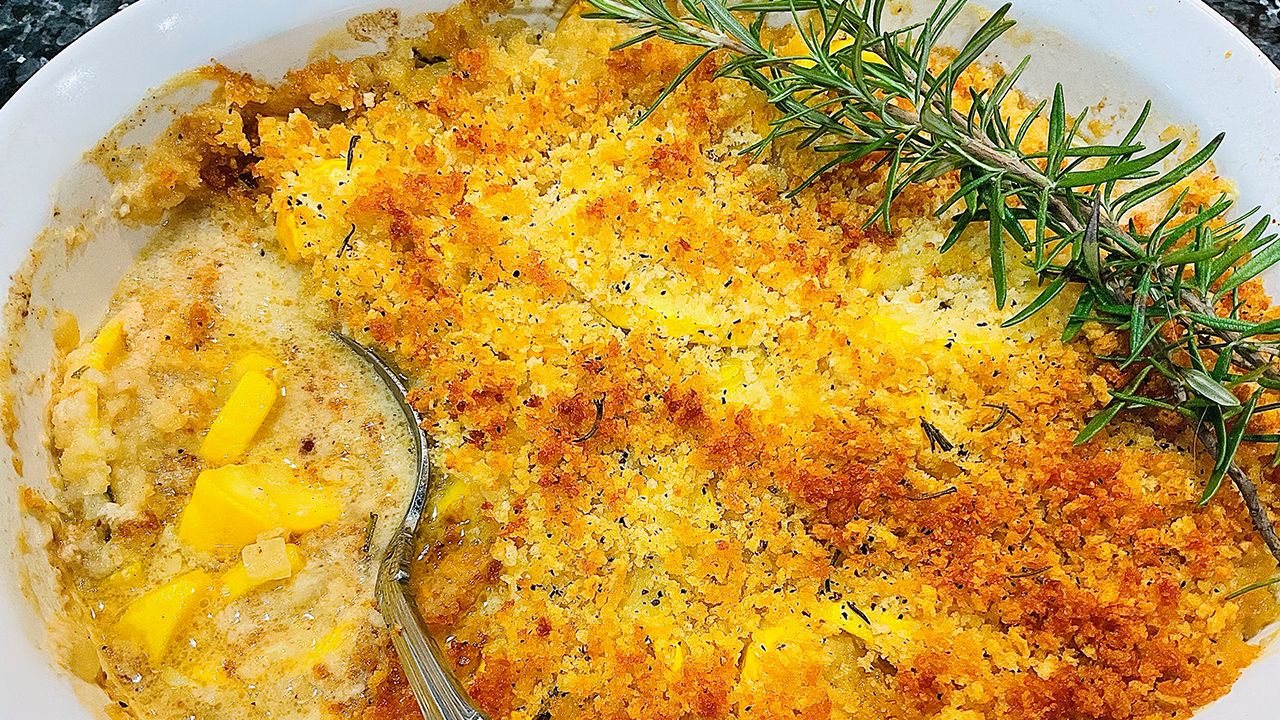 Creamy Cajun squash casserole baked until golden with breadcrumb topping.