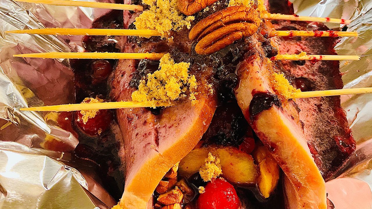 Dr Pepper glazed holiday ham with pineapple and cherries.