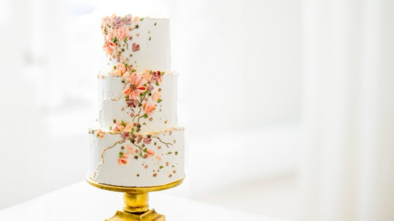 beautiful buttercream flower wedding cake with gold cake stand cake dummy tutorial for home bakers