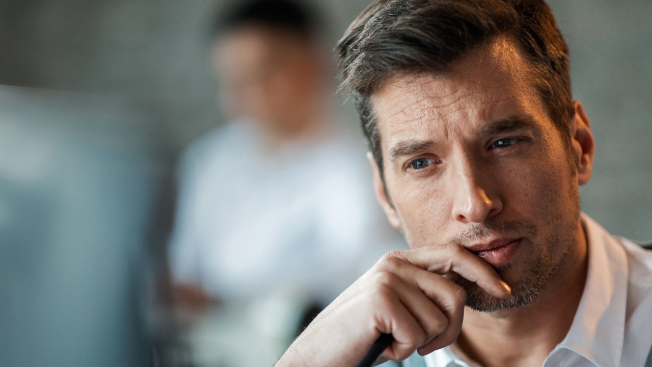 man in deep thought to represent taking himself too serious