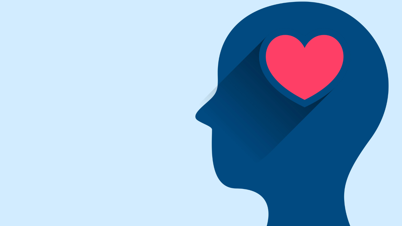 Illustration of a human head silhouette with a heart symbol inside the brain area, representing emotional intelligence and the connection between emotion and thought.