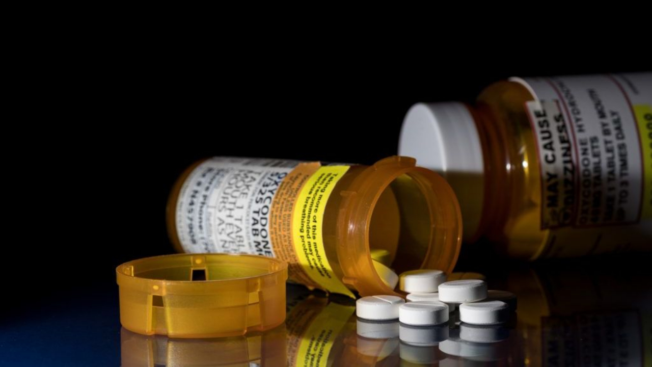 A bottle of pills is spilled