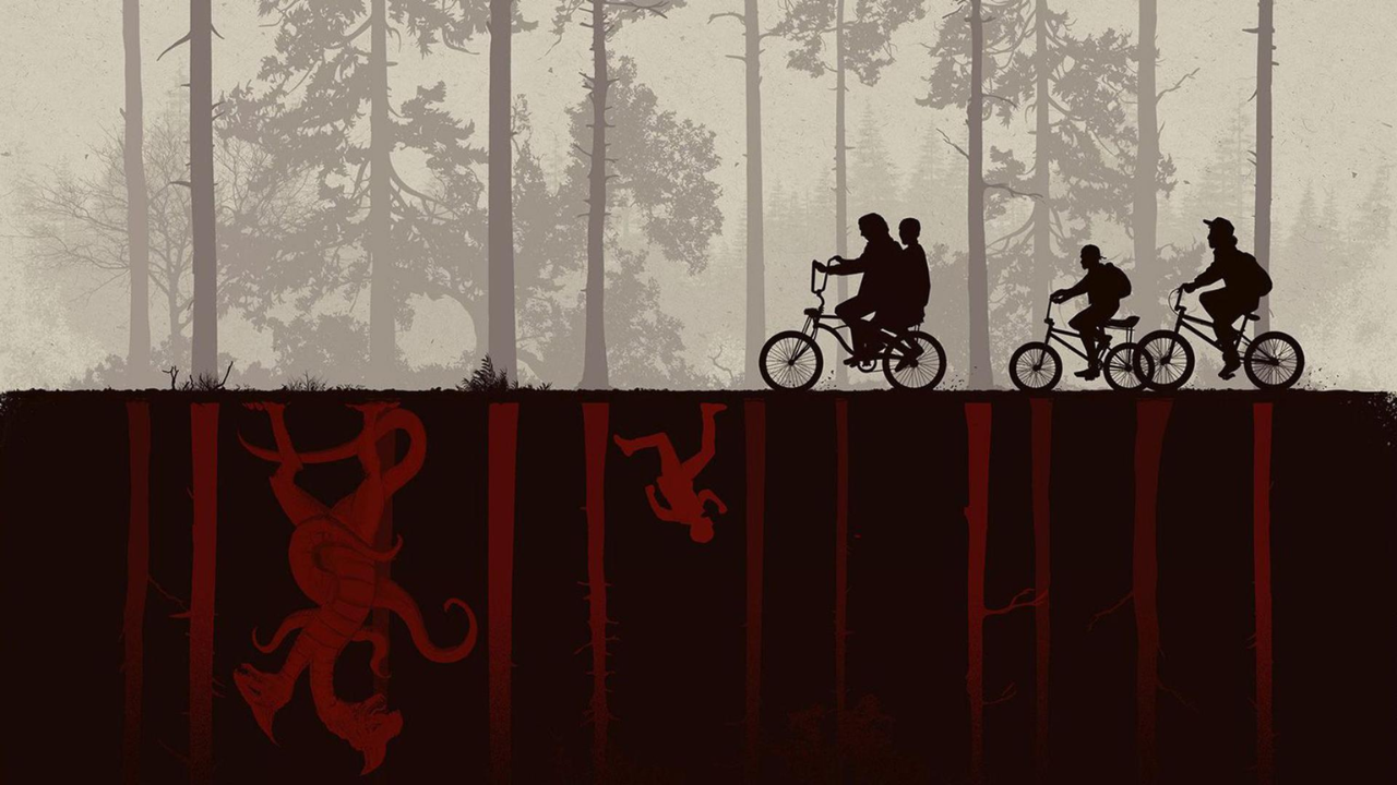 three kids on bikes riding above the Stranger Things Upside Down