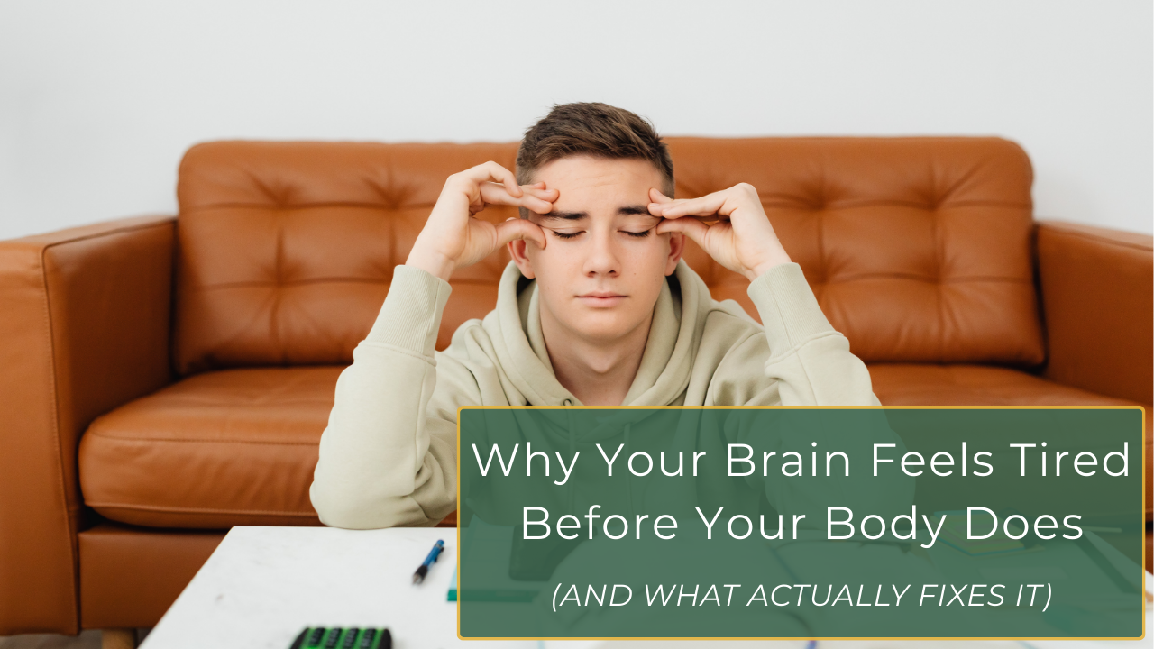A tired but thoughtful person sitting at a desk, surrounded by multiple open notebooks and ideas, holding their head with one hand — symbolizing hidden mental and emotional exhaustion.