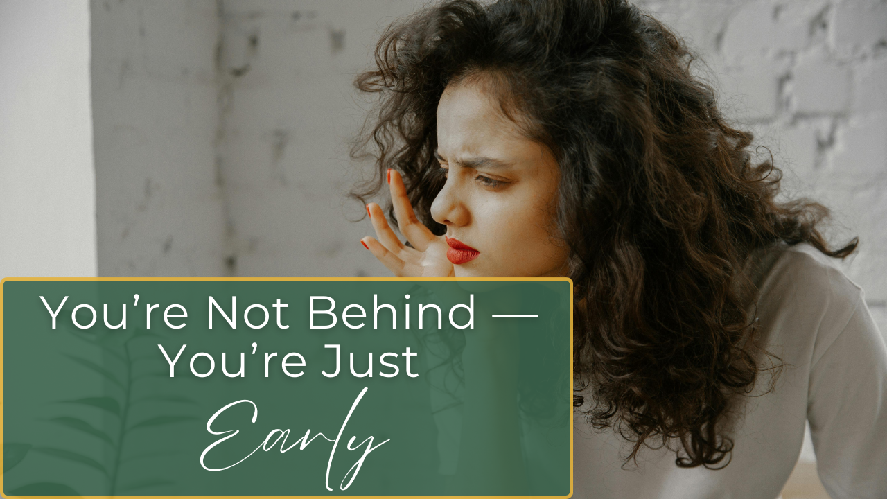 Winding path through a forest symbolizing nonlinear progress and personal timelines.