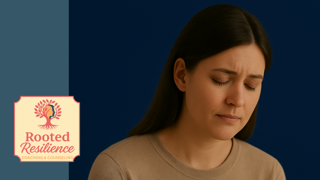 Person holding themselves gently, releasing self-blame after trauma