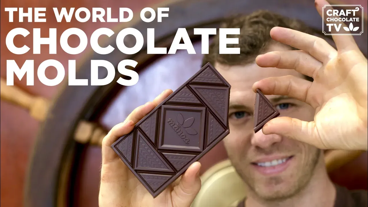 Image of a person holding a chocolate bar with text reading "The World Of Chocolate Molds". 