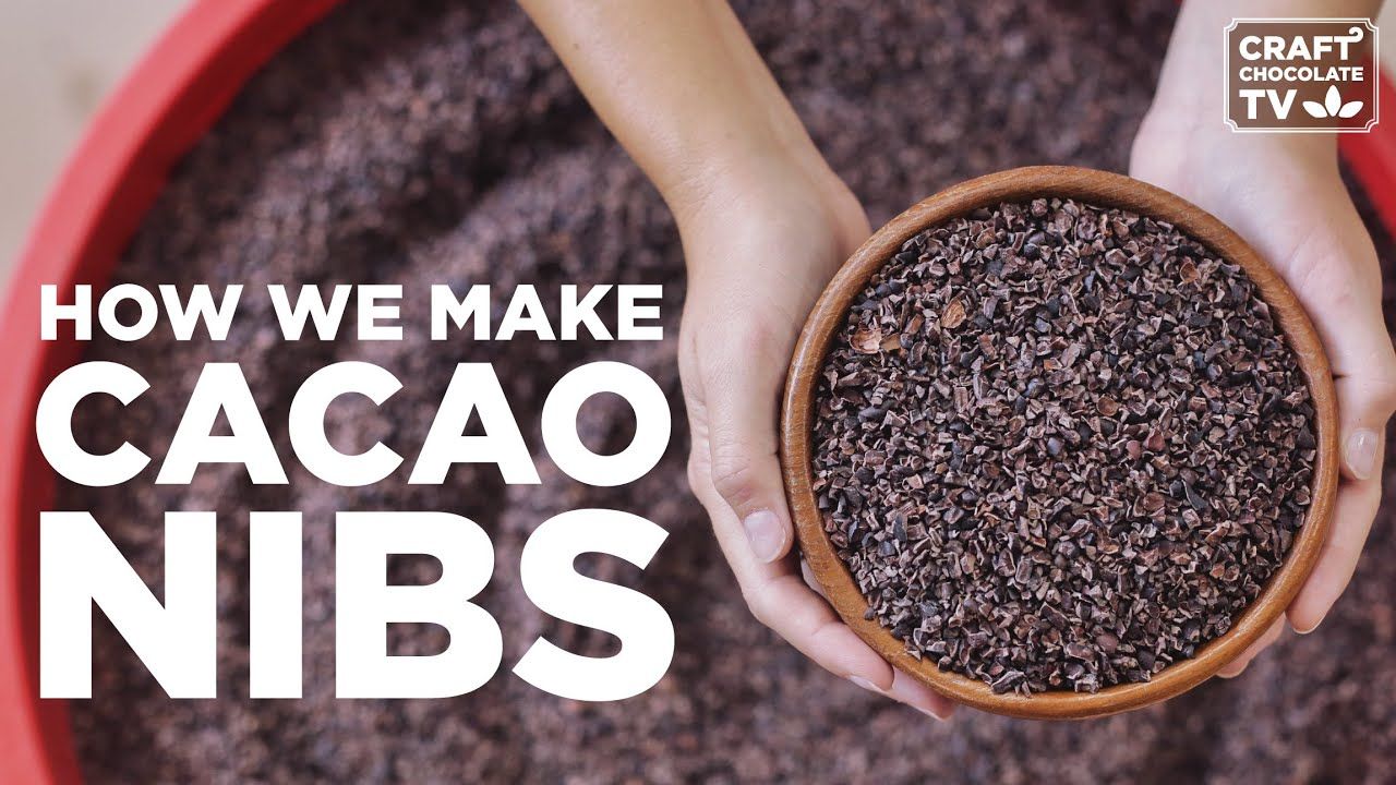 Image of hands holding cacao nibs with text reading "How We Make Cacao Nibs". 