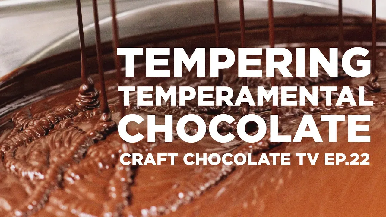 Image of chocolate in tempering machine with text reading "Tempering Temperamental Chocolate"