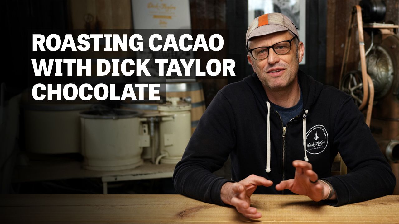 Image of man sitting at table with a text reading "Roasting Cacao With Dick Taylor Chocolate". 